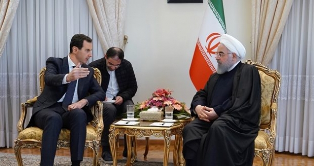 Esad'tan İran'a ziyaret ve Ruhani'yle görüşme