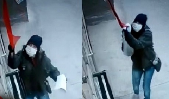 Türk bayrağını indirmeye çalışan kadın kameraya yakalandı ve gözaltına alındı