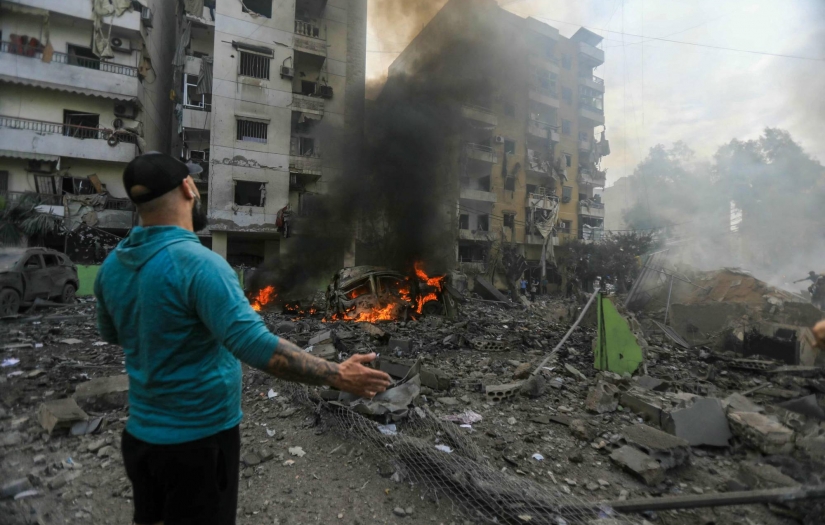 Beyrut banliyösünü bombalayan İsrail Lübnan'ın her yerini vurma tehdidinde bulundu