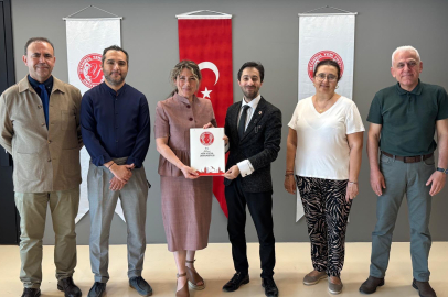 KİAMP Türkiye'de Azerbaycan'ın yüz akı oldu: İstanbul Yeni Yüzyıl Üniversitesi  ile Stratejik İş Birliği Anlaşması
